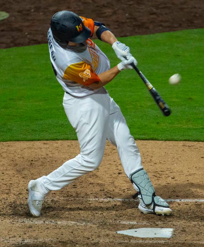 Las Vegas Aviators catcher Dustin Garneau (18) hits a long ball off the wall versus the Sacrame ...