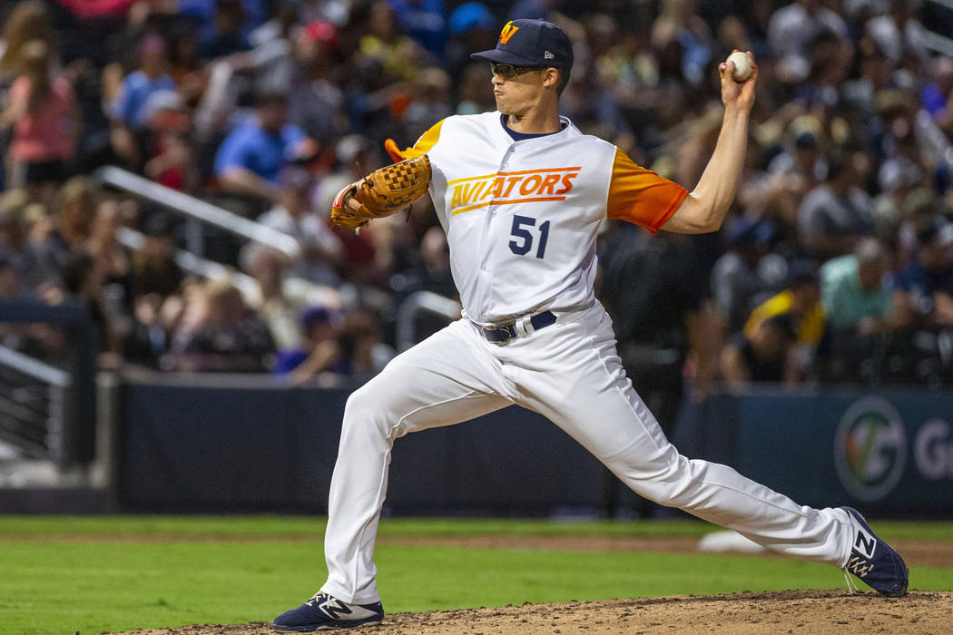 Las Vegas Aviators pitcher Kyle Lobstein (51) tosses a ball over the plate versus the Sacrament ...