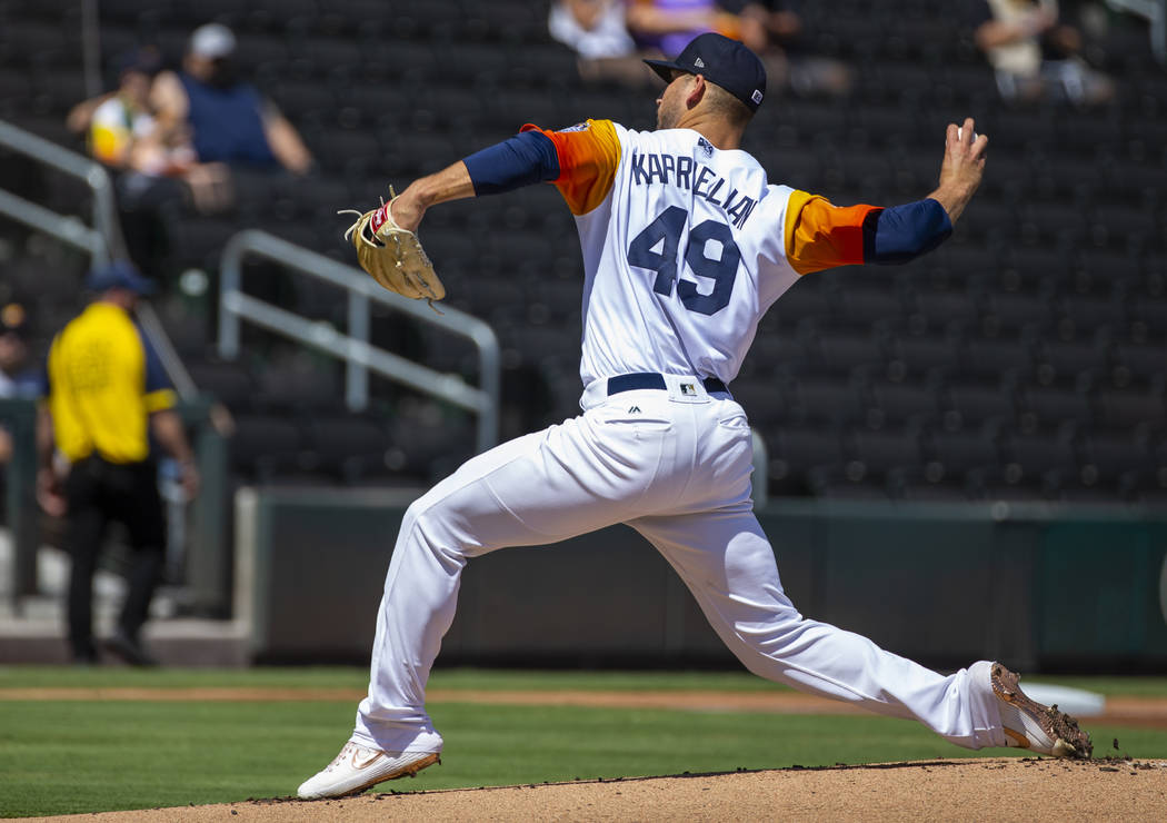 Las Vegas Aviators pitcher James Kaprielian (49) winds up on the mound in the first inning vers ...