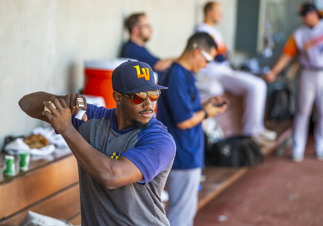 Las Vegas Aviators shortstop Jorge Mateo (14) with two broken fingers still swings an imaginary ...