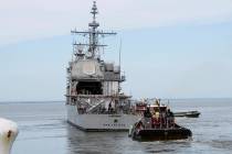 This image provided by the US Navy shows the USS San Jacinto (CG-56) as it heads out of the it' ...