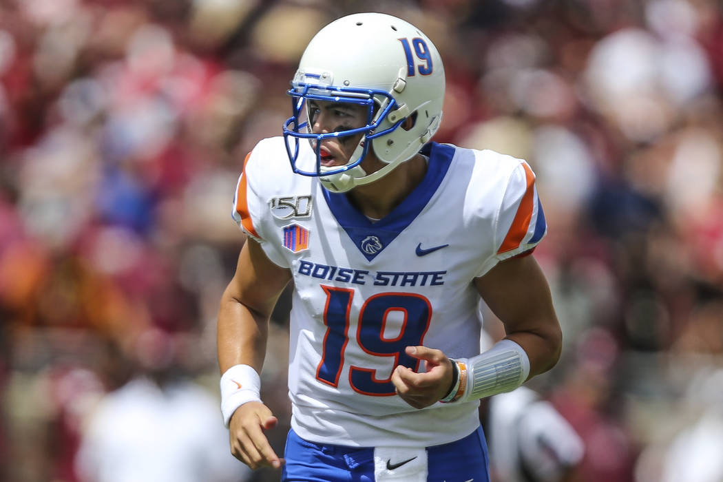 Boise State quarterback Hank Bachmeier (19) after handing off the ball during an NCAA football ...