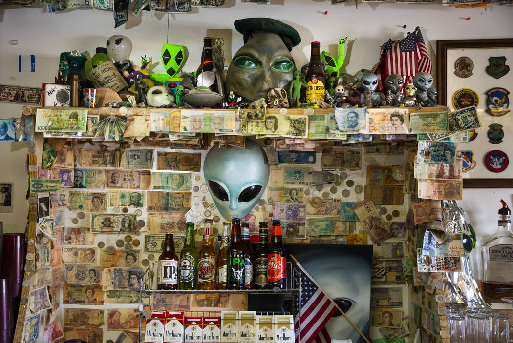 Alien memorabilia behind the bar and the restaurant at the Little A'Le'Inn which is to be a gat ...