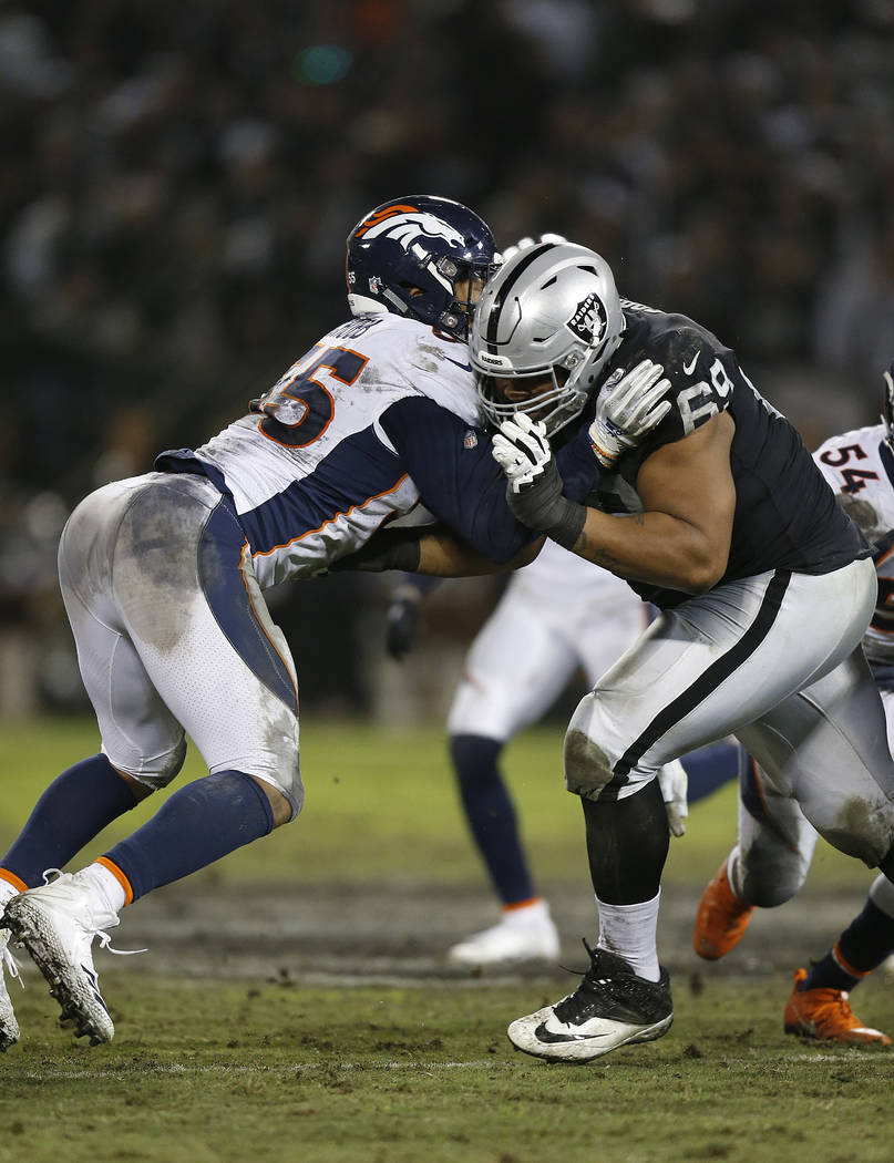 Oakland Raiders offensive tackle Denzelle Good (69) blocks Denver Broncos outside linebacker Br ...