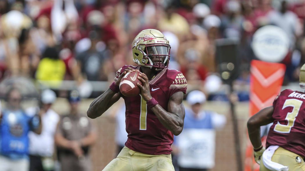 Florida State quarterback James Blackman (1) looks for a receiver during an NCAA football game ...