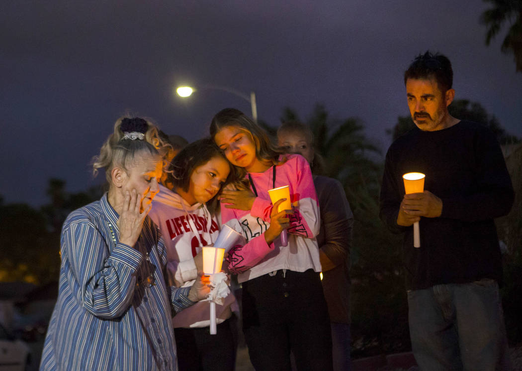 Mary Ann Ratay, left, talks about her daughter, Jennifer Ratay, during a vigil in her memory wh ...