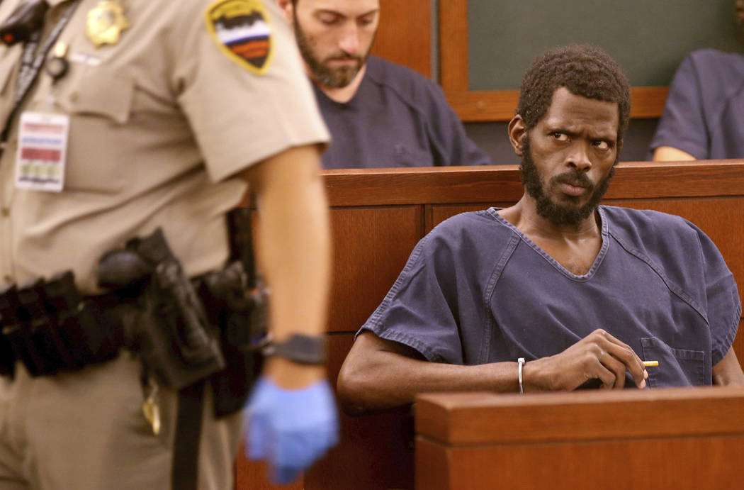 Clinton Taylor, front, appears in court at the Regional Justice Center in Las Vegas Wednesday, ...