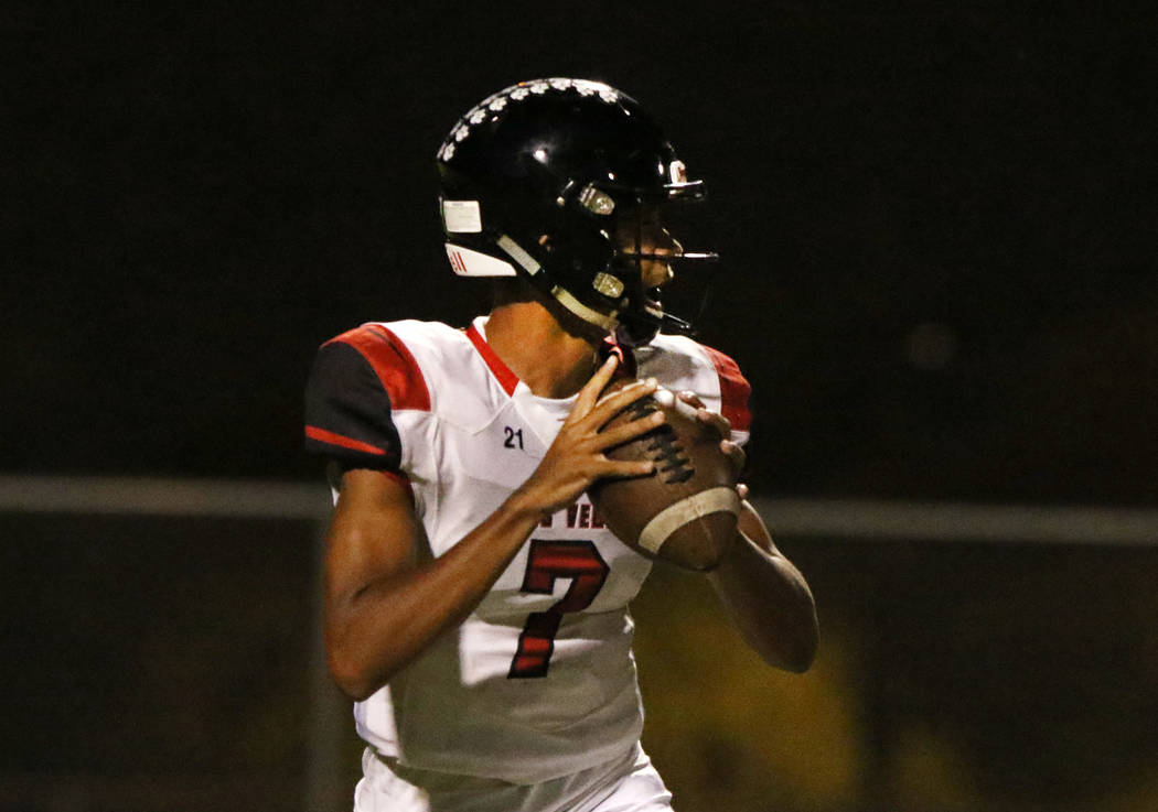 Las Vegas High's quarterback Ja'shawn Scroggins sets up to pass the ball during the first half ...