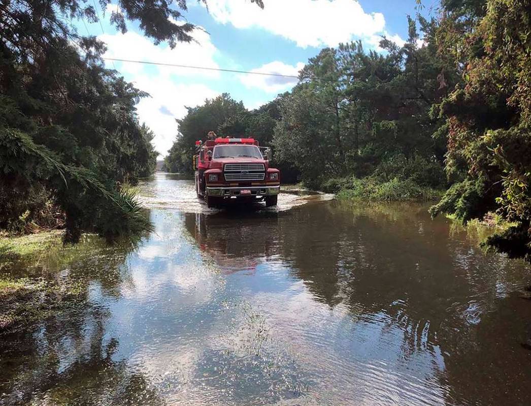 The Ocracoke Volunteer Fire Department makes rounds through the village on Friday, Sept. 6, 201 ...