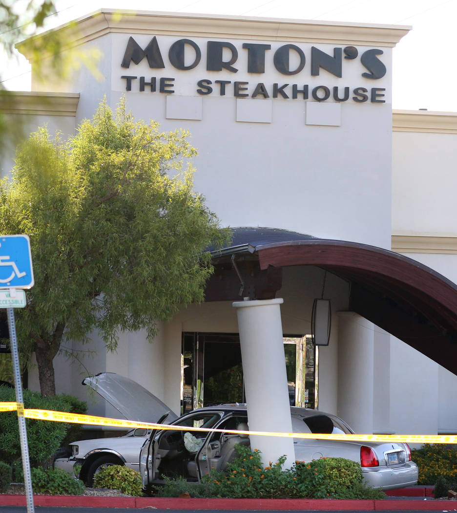 A driver suspected of being under the influence crashed his vehicle into Morton's The Steakhous ...