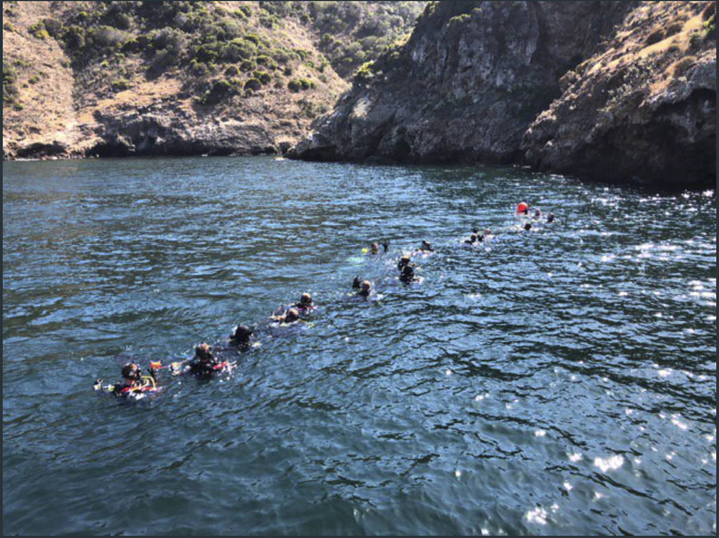 This photo provided by Santa Barbara County on Wednesday, Sept. 4, 2019 shows divers and suppor ...