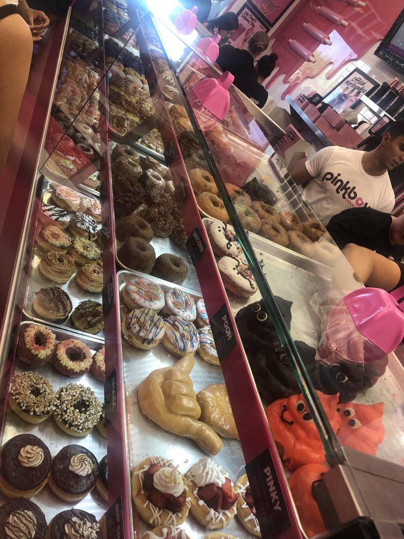 The doughnut case at the grand opening of Pinkbox Doughnuts at 9435 W. Tropicana Ave. is shown ...