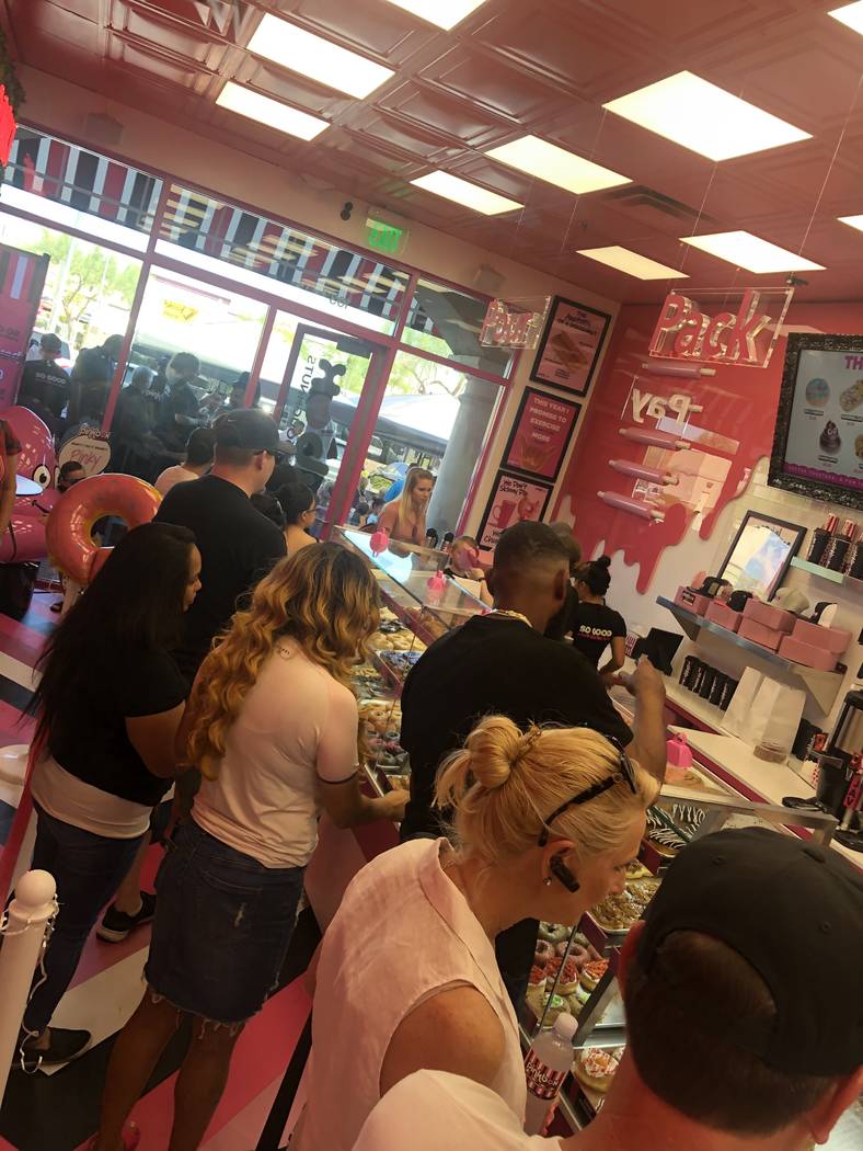 The crowd at the grand opening of Pinkbox Doughnuts at 9435 W. Tropicana Ave. is shown on Satur ...