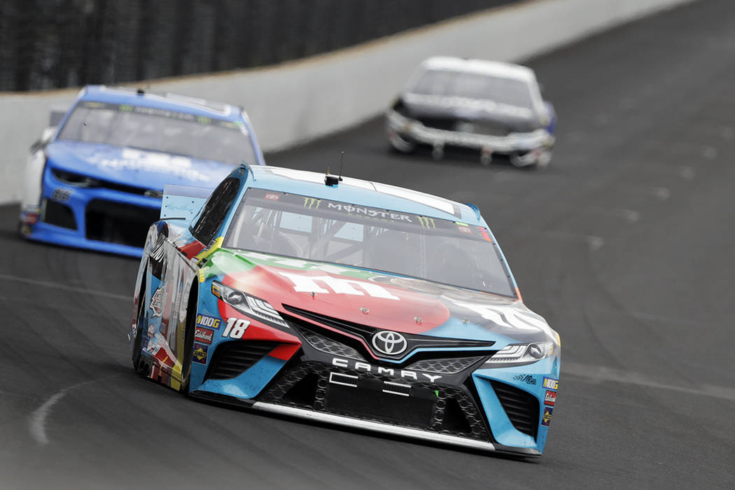 Kyle Busch drives into turn one during the NASCAR Brickyard 400 auto race at Indianapolis Motor ...