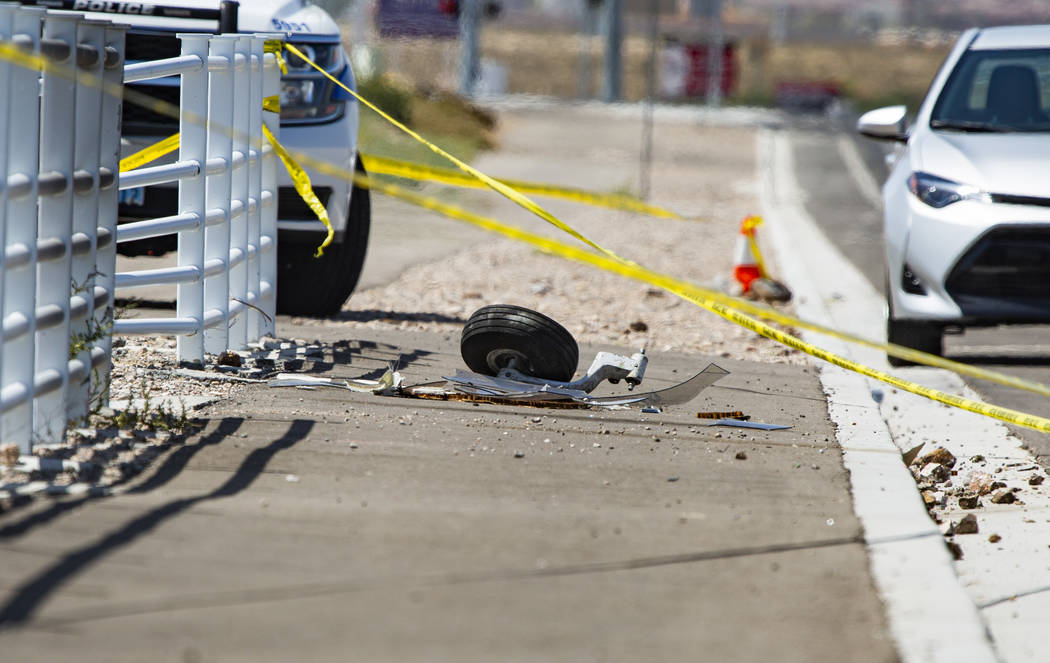 A piece of the plane that crashed Saturday night south of the Henderson Executive Airport in He ...