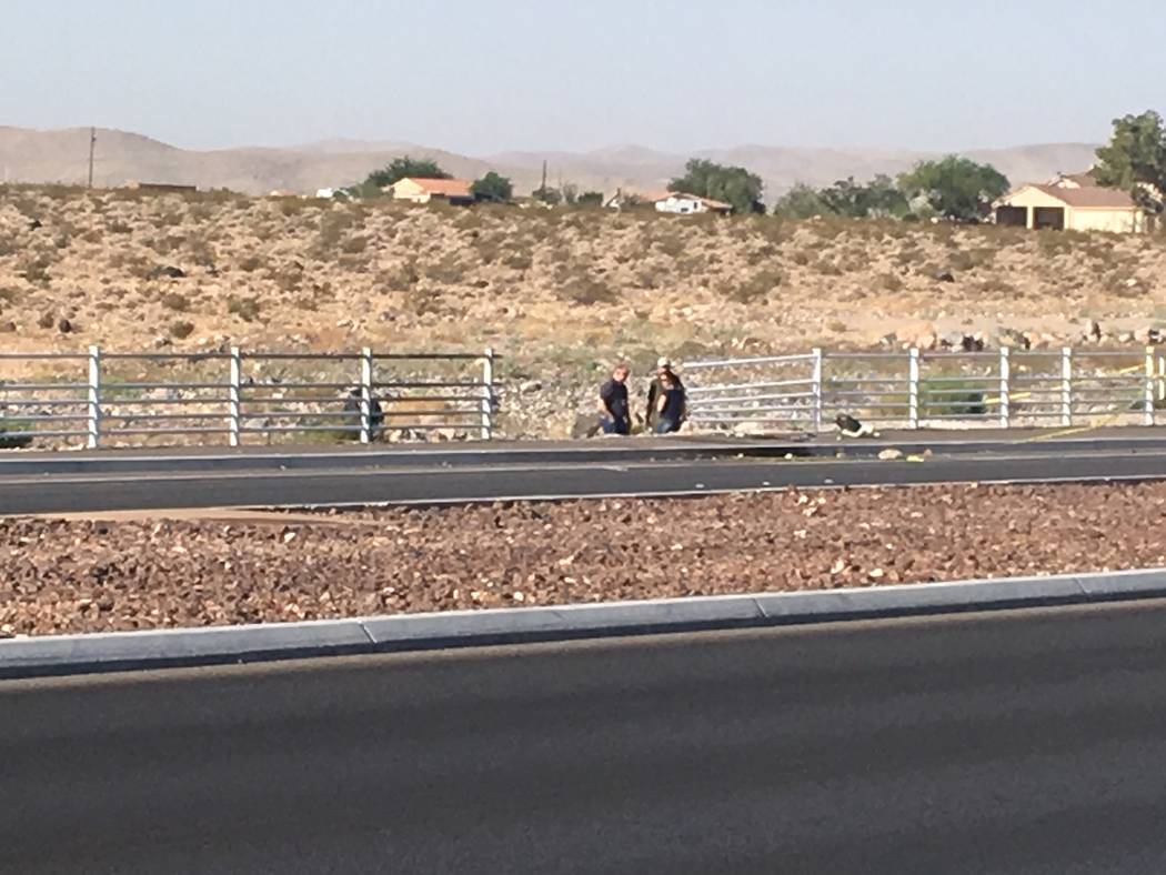 Investigators on scene after a small propeller plane crashed near Henderson Executive Airport o ...