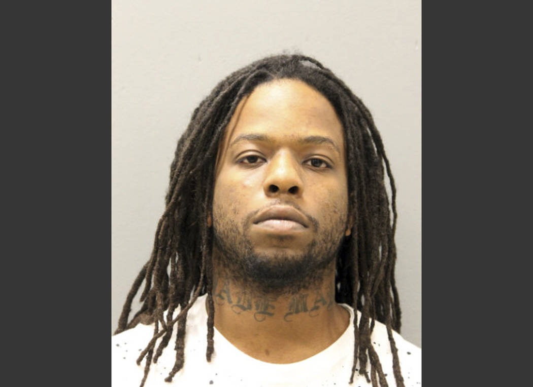 FILE - This file photo provided by the Chicago Police Department shows Corey Morgan. Two of thr ...