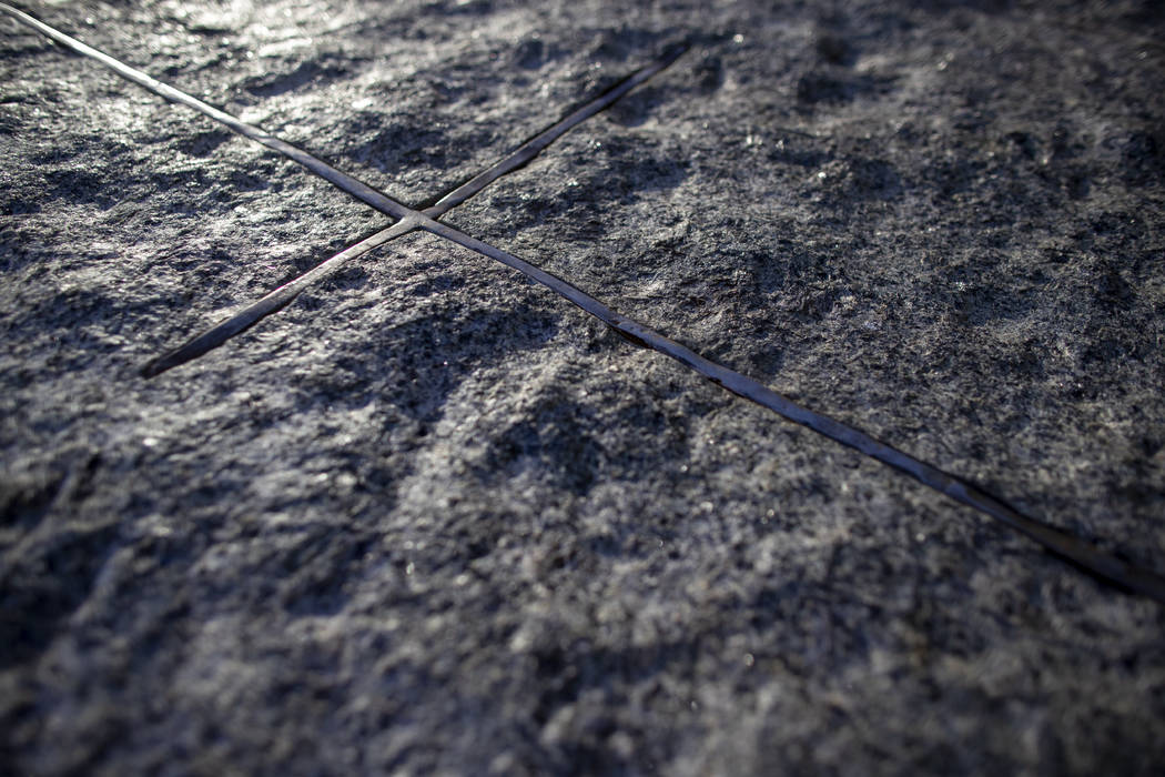 In this Thursday, Aug. 29, 2019, photo a detail of one of the granite slabs and the steel from ...