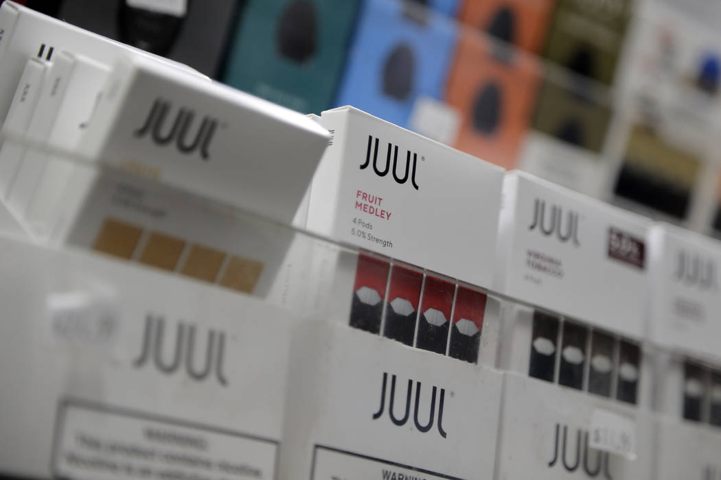 A Dec. 20, 2018, file photo shows Juul products displayed at a smoke shop in New York. Federal ...