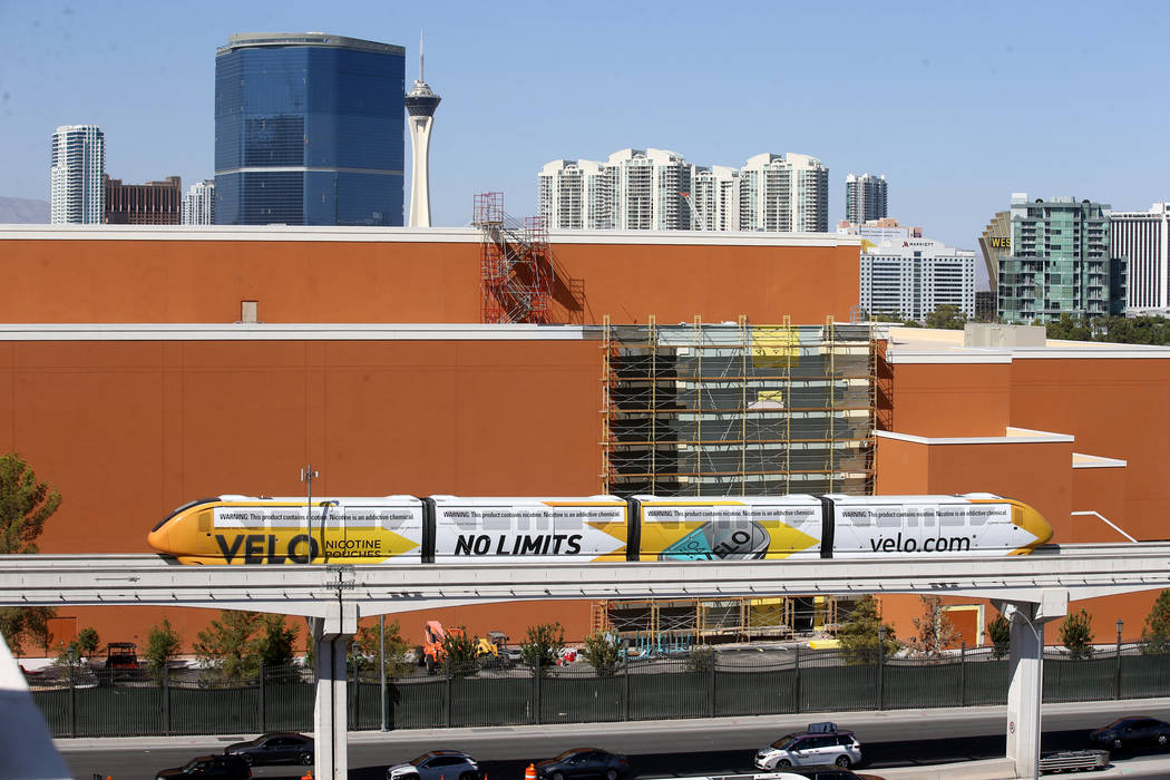 Las Vegas Monorail trains pass the under-construction MSG Sphere performance venue in Las Vegas ...