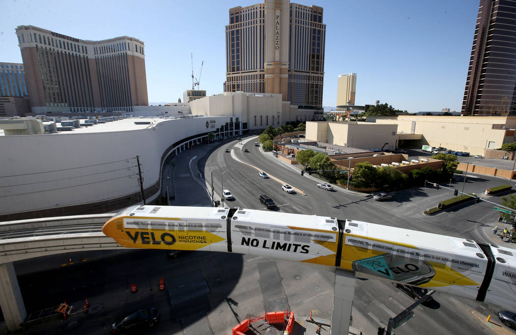 Las Vegas Monorail trains pass the under-construction MSG Sphere performance venue in Las Vegas ...