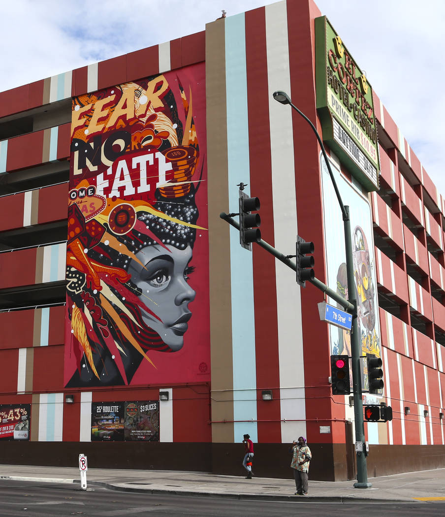 A mural is shown as setup goes on for the Life is Beautiful music and arts festival in downtown ...