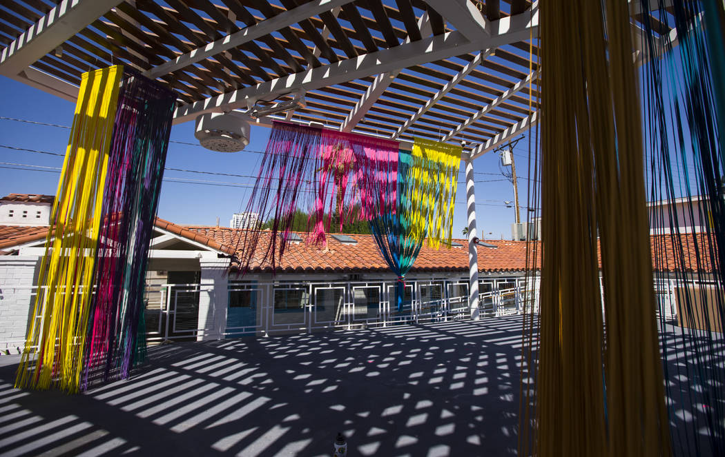 A view of the patio deck featuring an art installation by Clarice Tara at Fergusons Downtown at ...