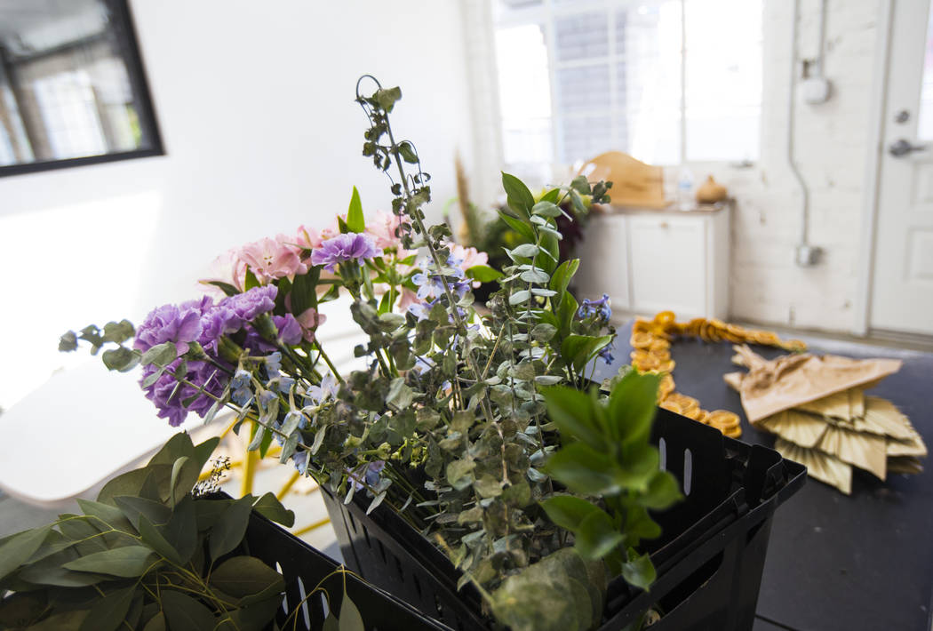 Flowers at The Tiny Bloom, a local floral shop, as setup continues at Fergusons Downtown at Fre ...