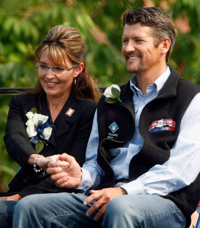 FILE - In this July 26, 2009, file photo, former Alaska Gov. Sarah Palin holds her husband's To ...