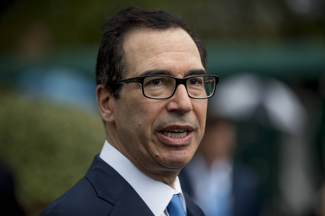 In a Sept. 9, 2019, photo, Treasury Secretary Steve Mnuchin speaks to reporters outside the Wes ...