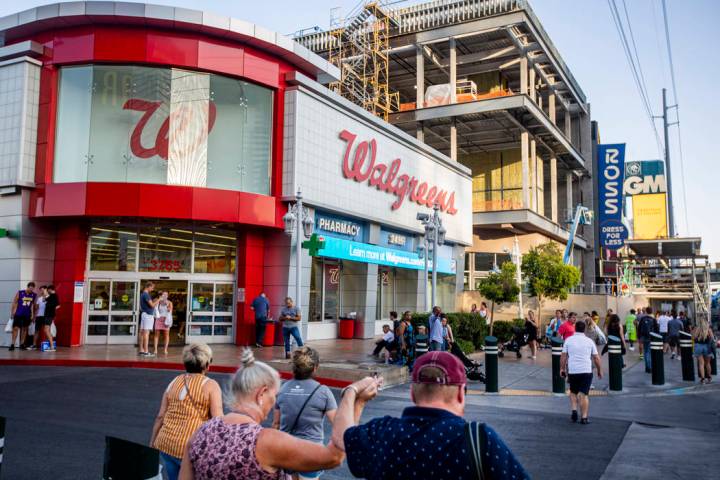 People walk by the Walgreens on the Las Vegas Strip on Tuesday, Sept. 10, 2019, in Las Vegas. T ...