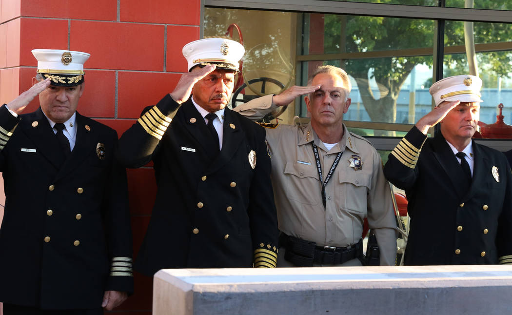 City of Las Vegas Fire Chief William McDonald, second left, and Clark County Sheriff Joseph Lom ...