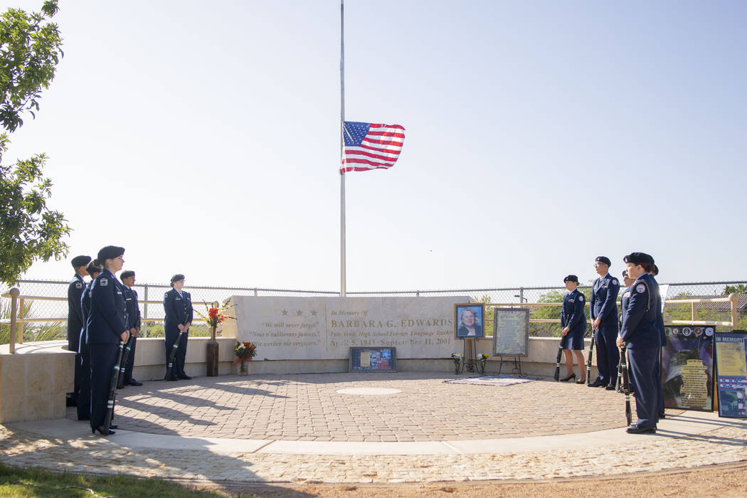 Palo Verde High School students in the Air Force JROTC stand in memory of the school's foreign ...