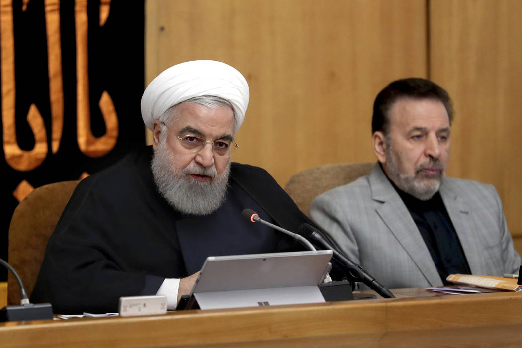 In this photo released by the office of the Iranian Presidency, President Hassan Rouhani speaks ...