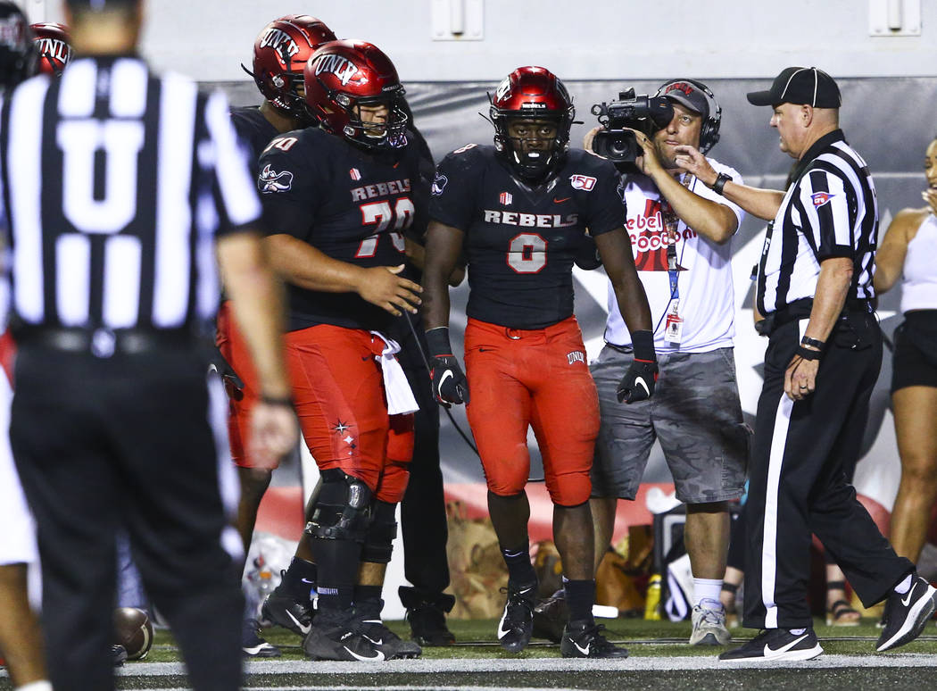 UNLV Rebels running back Charles Williams (8) after scoring a touchdown against the Arkansas St ...