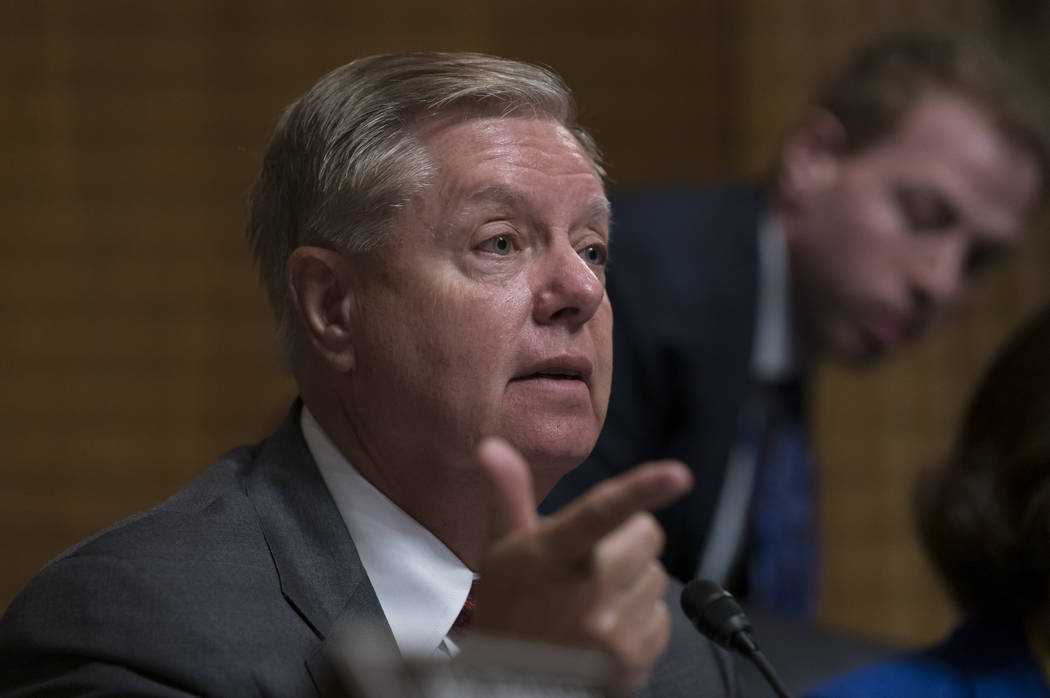 Senate Judiciary Committee Chairman Lindsey Graham, R-S.C., directs White House lawyer Steven M ...