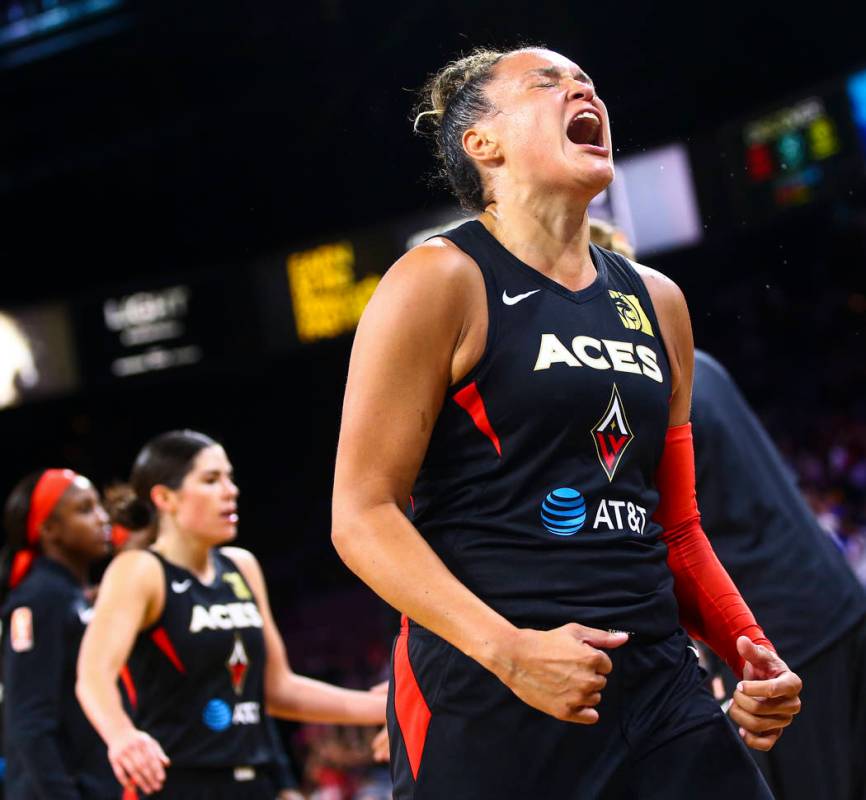 Las Vegas Aces' Kayla McBride (21) reacts during the second half of a WNBA basketball game agai ...