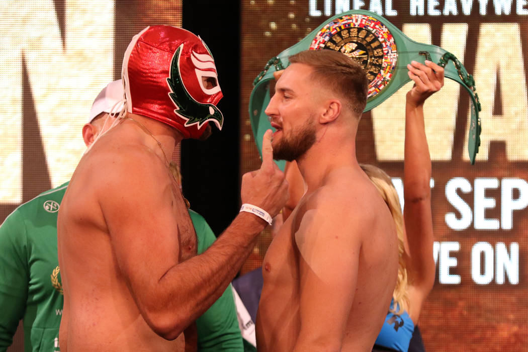 Tyson Fury, left, and Otto Wallin face-off at a weigh-in on Friday, Sept. 13, 2019 at the MGM G ...
