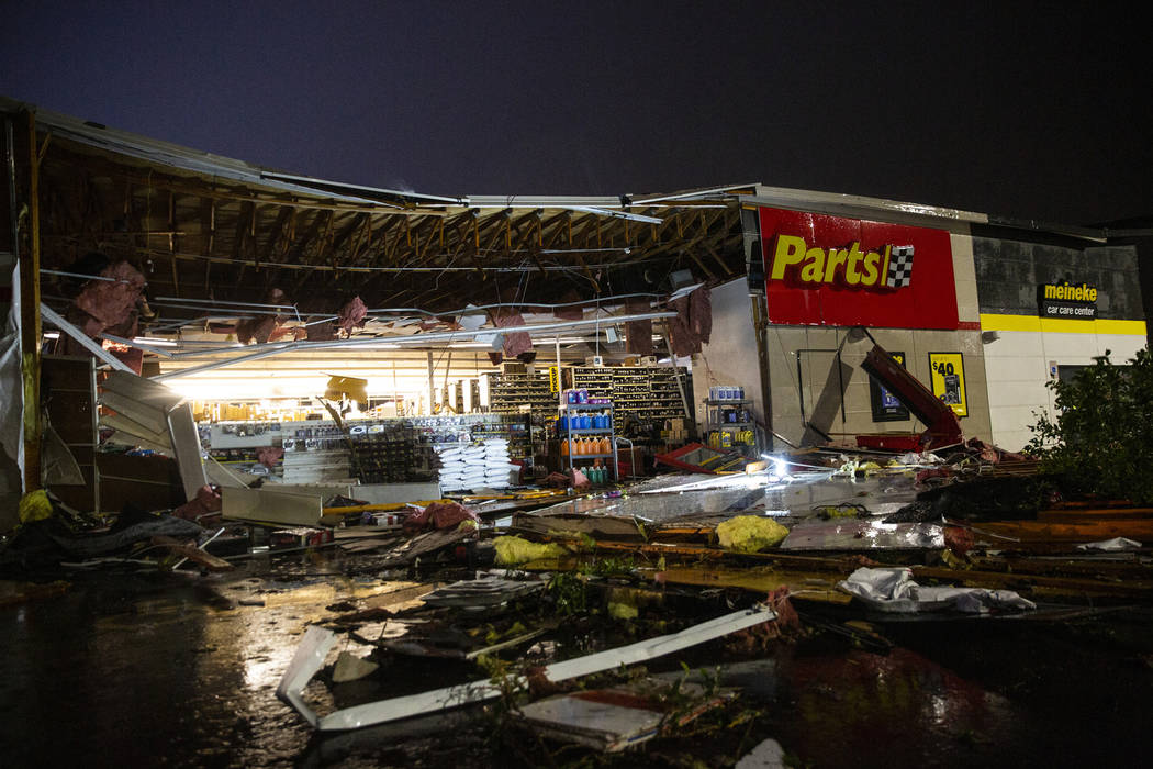 In this Tuesday, Sept. 10, 2019 photo, debris litters the ground at Advance Auto Parts followin ...