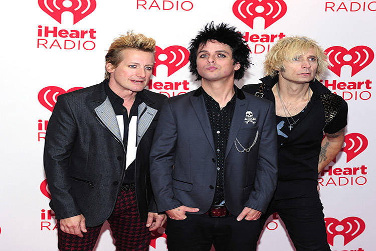 Drummer Tre Cool, frontman Billie Joe Armstrong and bassist Mike Dirnt of the band Green Day po ...