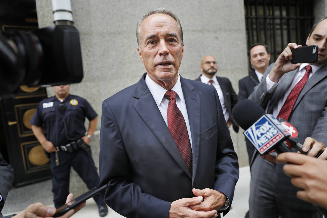 U.S. Rep. Chris Collins, R-N.Y., speaks to reporters as he leaves the courthouse after a pretri ...