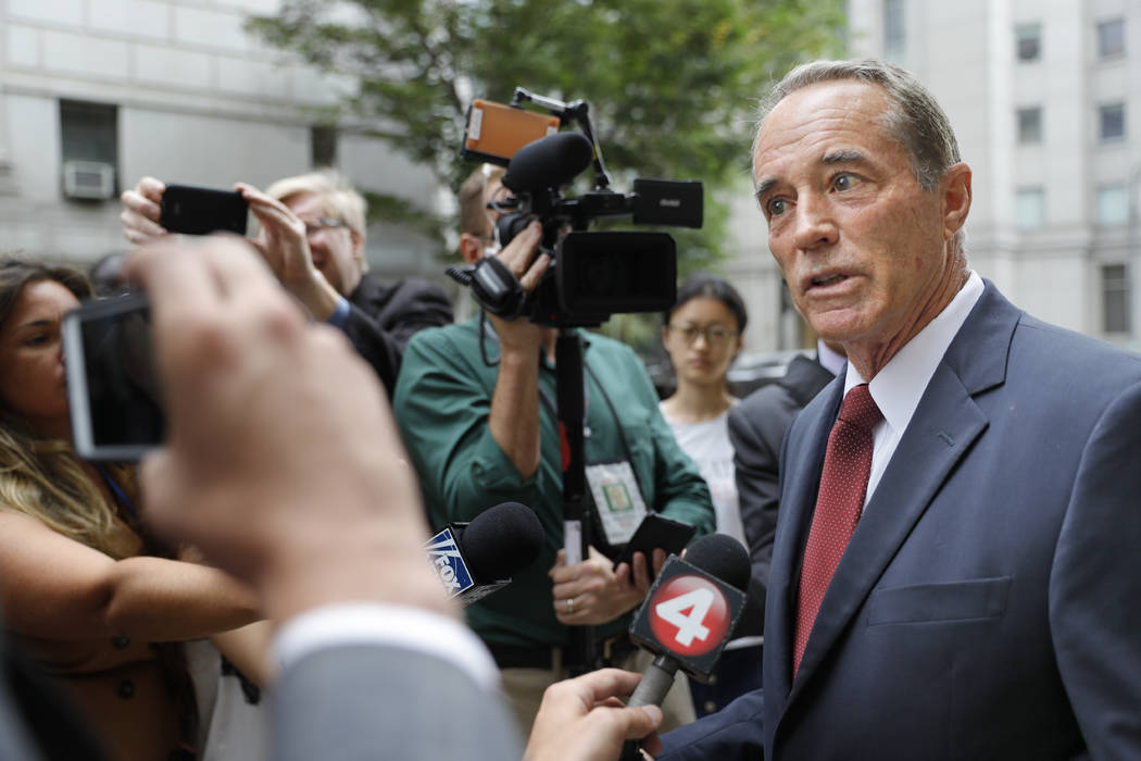 U.S. Rep. Chris Collins, R-N.Y., speaks to reporters as he leaves the courthouse after a pretri ...