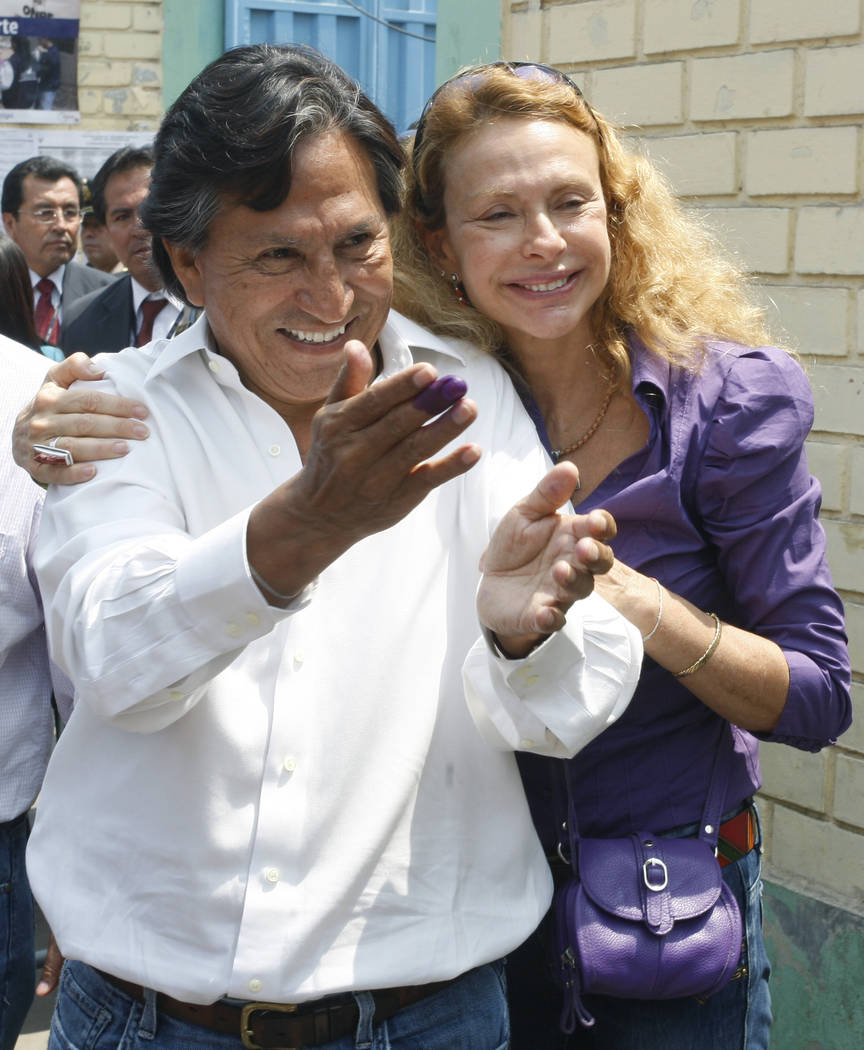 FILE - In this April 10, 2011 file photo Presidential candidate Alejandro Toledo, accompanied b ...