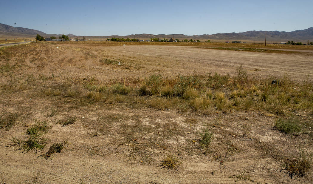 A piece of land yet prepared just south of the Little A'Le'Inn is slated to house parking and c ...