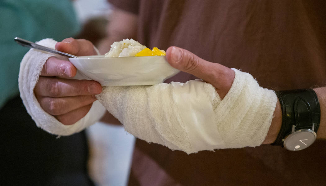 Chris Kachurak as Nicky enjoys some dessert with hands wrapped from frostbite during the Oakey ...