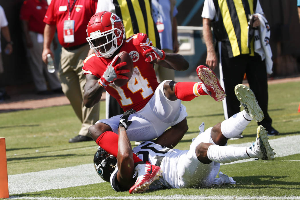 Kansas City Chiefs wide receiver Sammy Watkins (14) catches a 3-yard touchdown pass over Jackso ...