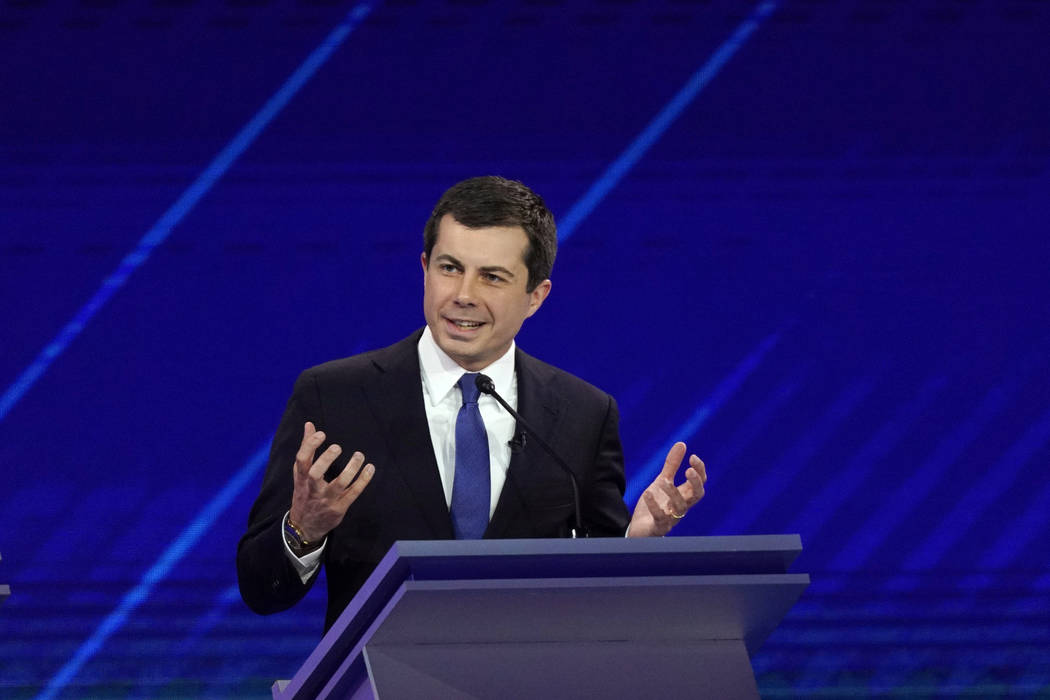 Democratic presidential candidate South Bend Mayor Pete Buttigieg answers a question Thursday, ...