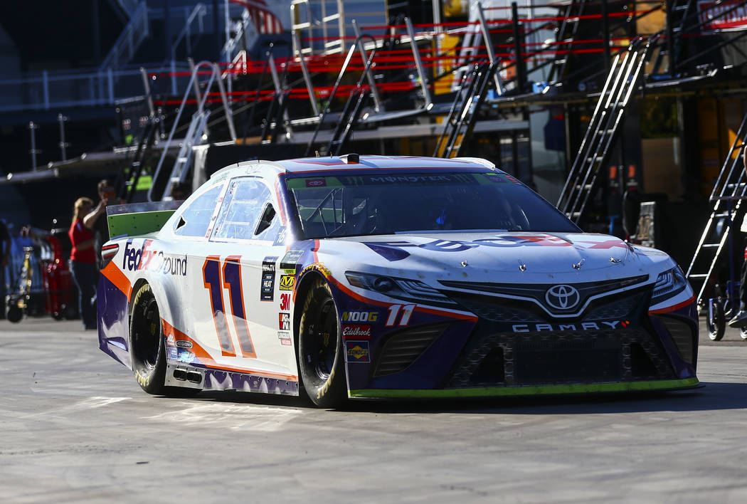 Denny Hamlin (11) heads to the track during qualifying for the Monster Energy NASCAR Cup Series ...