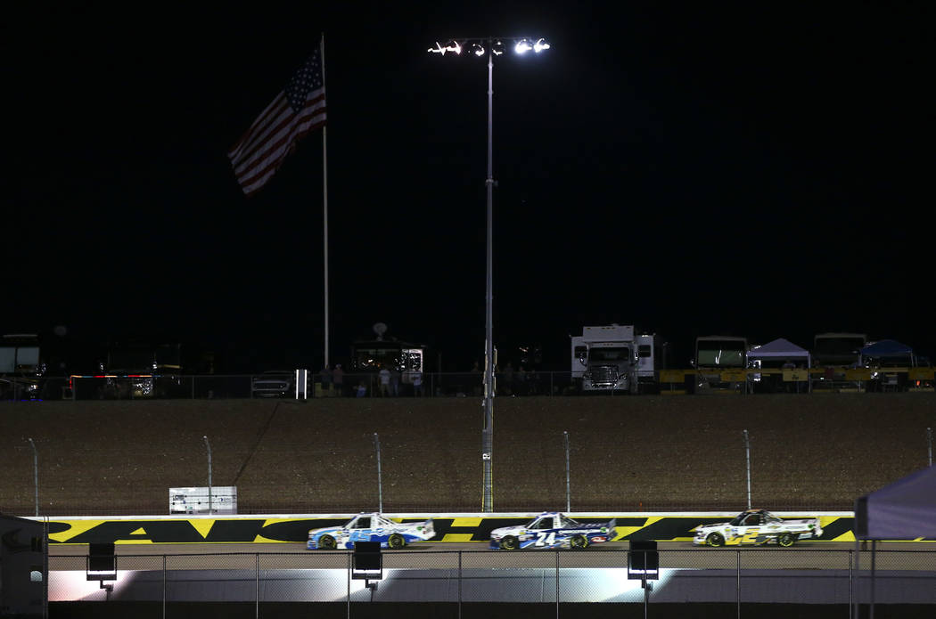 Drivers compete during the NASCAR World of Westgate 200 Truck Series auto race at the Las Vegas ...