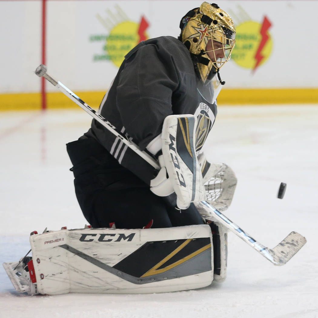 Vegas Golden Knights goaltender Marc-Andre Fleury (29) blocks a shot during a team practice at ...